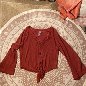 Button up tie bottom bell sleeve top.